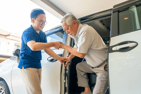 male-caregiver-help-senior-man-600nw-2616416495